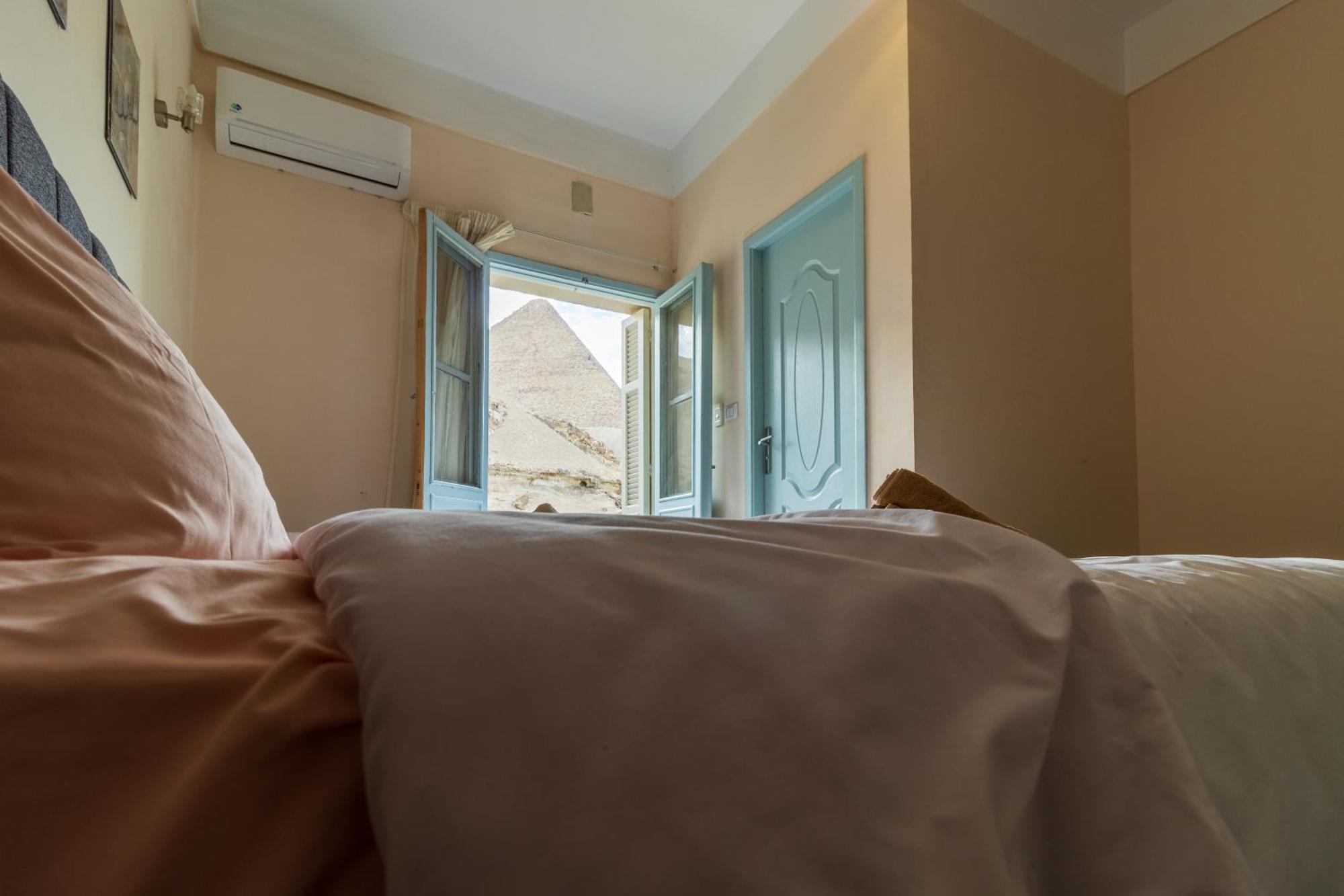 The Grand Pyramids View Hotel Kafret el-Gabal Quarto foto