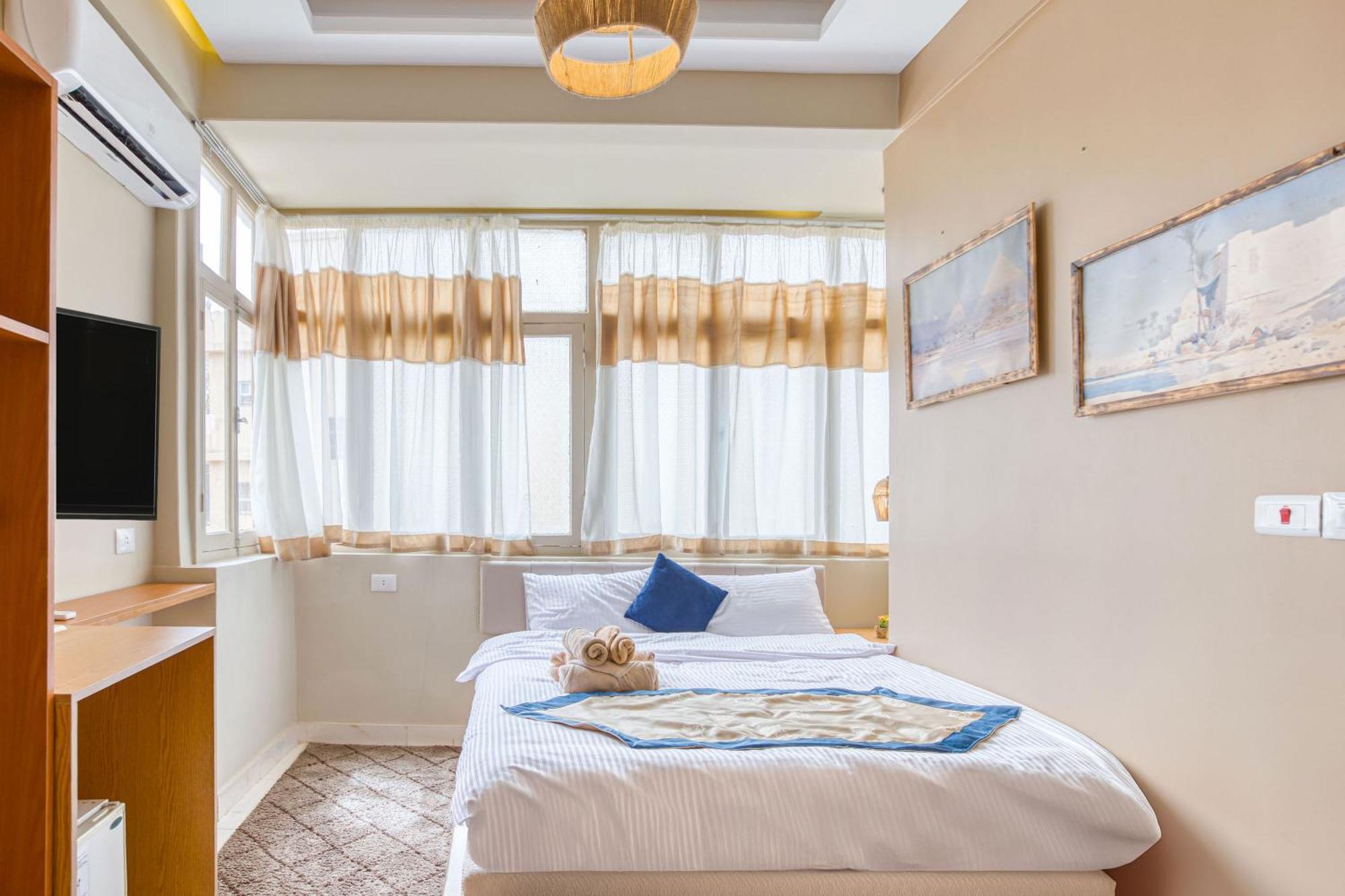 The Grand Pyramids View Hotel Kafret el-Gabal Quarto foto