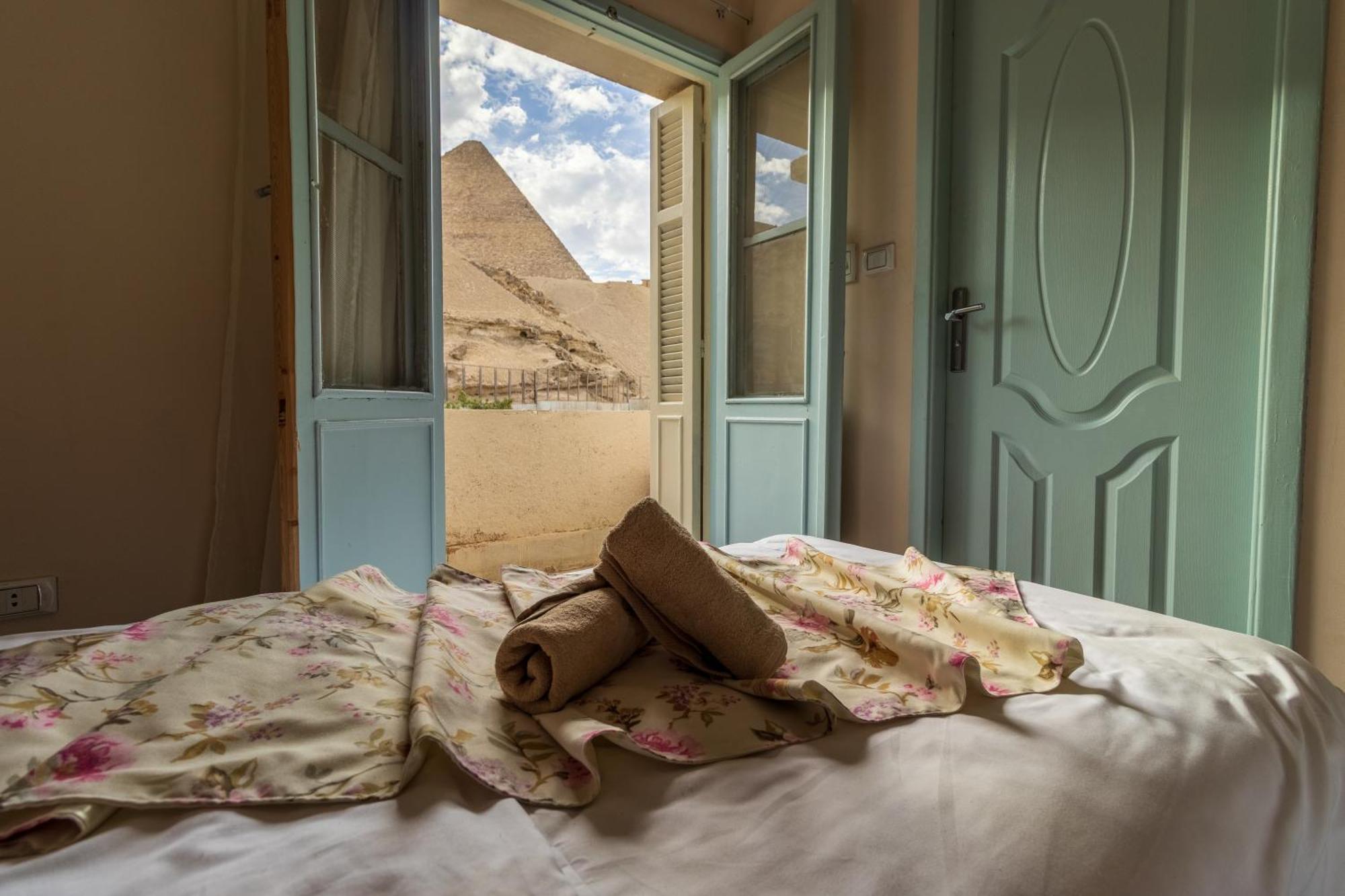 The Grand Pyramids View Hotel Kafret el-Gabal Quarto foto