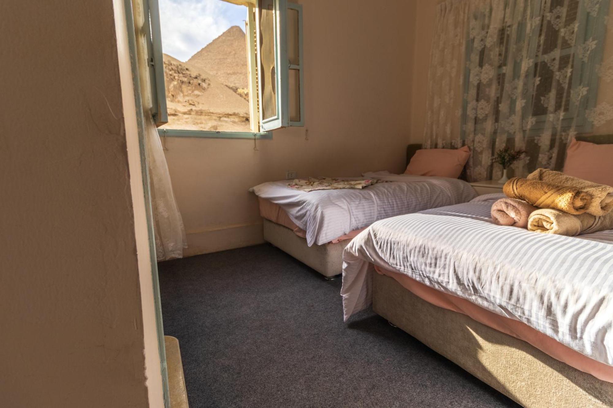 The Grand Pyramids View Hotel Kafret el-Gabal Quarto foto