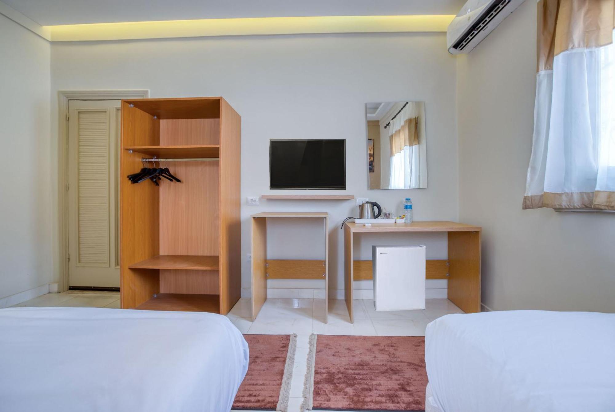 The Grand Pyramids View Hotel Kafret el-Gabal Quarto foto