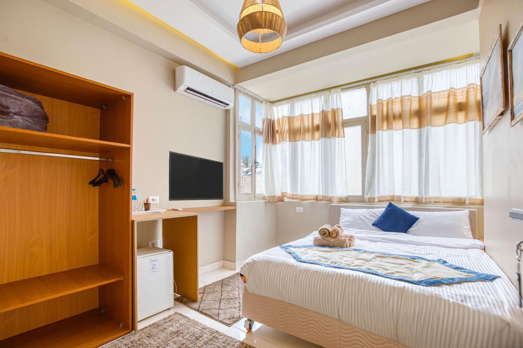 The Grand Pyramids View Hotel Kafret el-Gabal Quarto foto