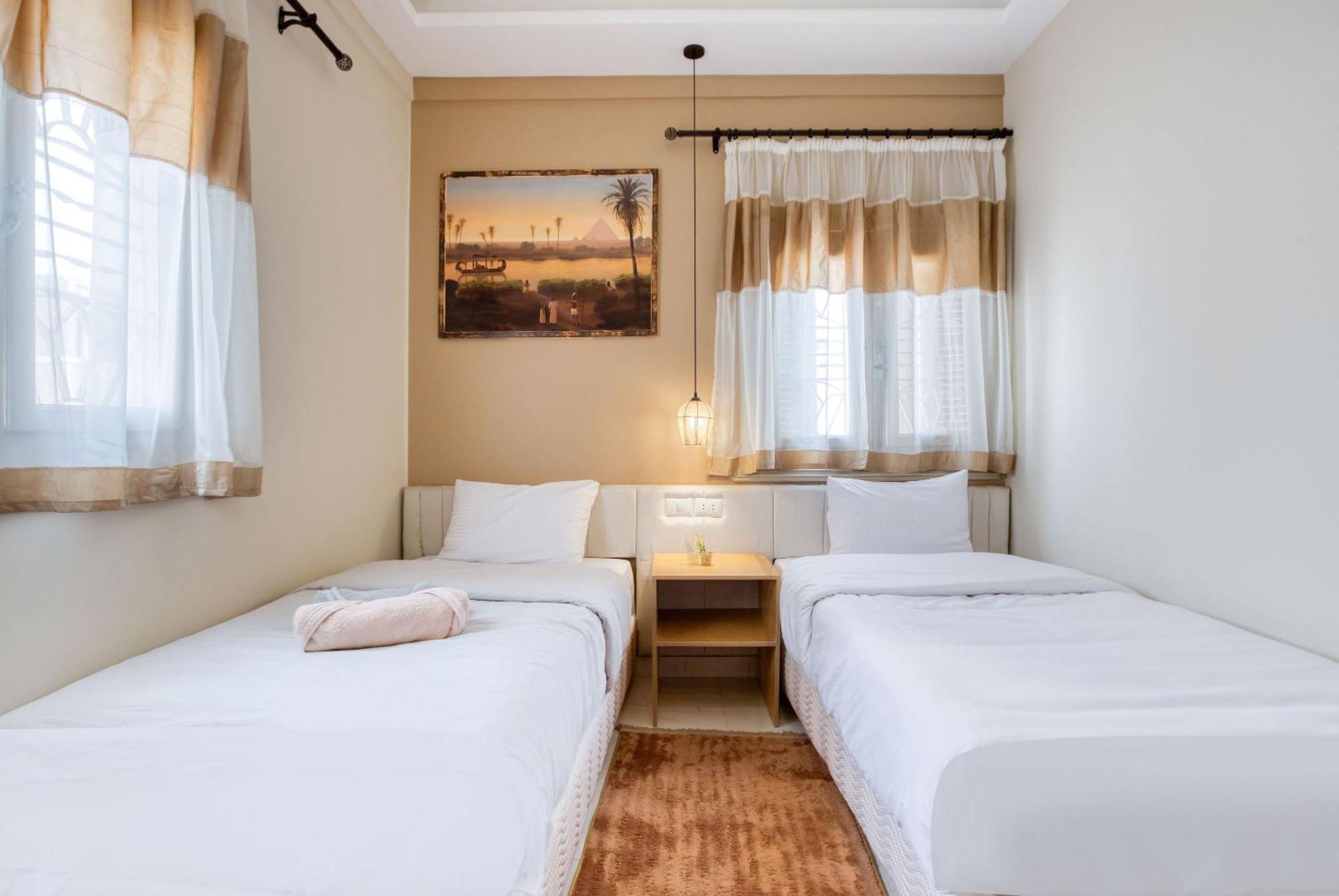 The Grand Pyramids View Hotel Kafret el-Gabal Quarto foto