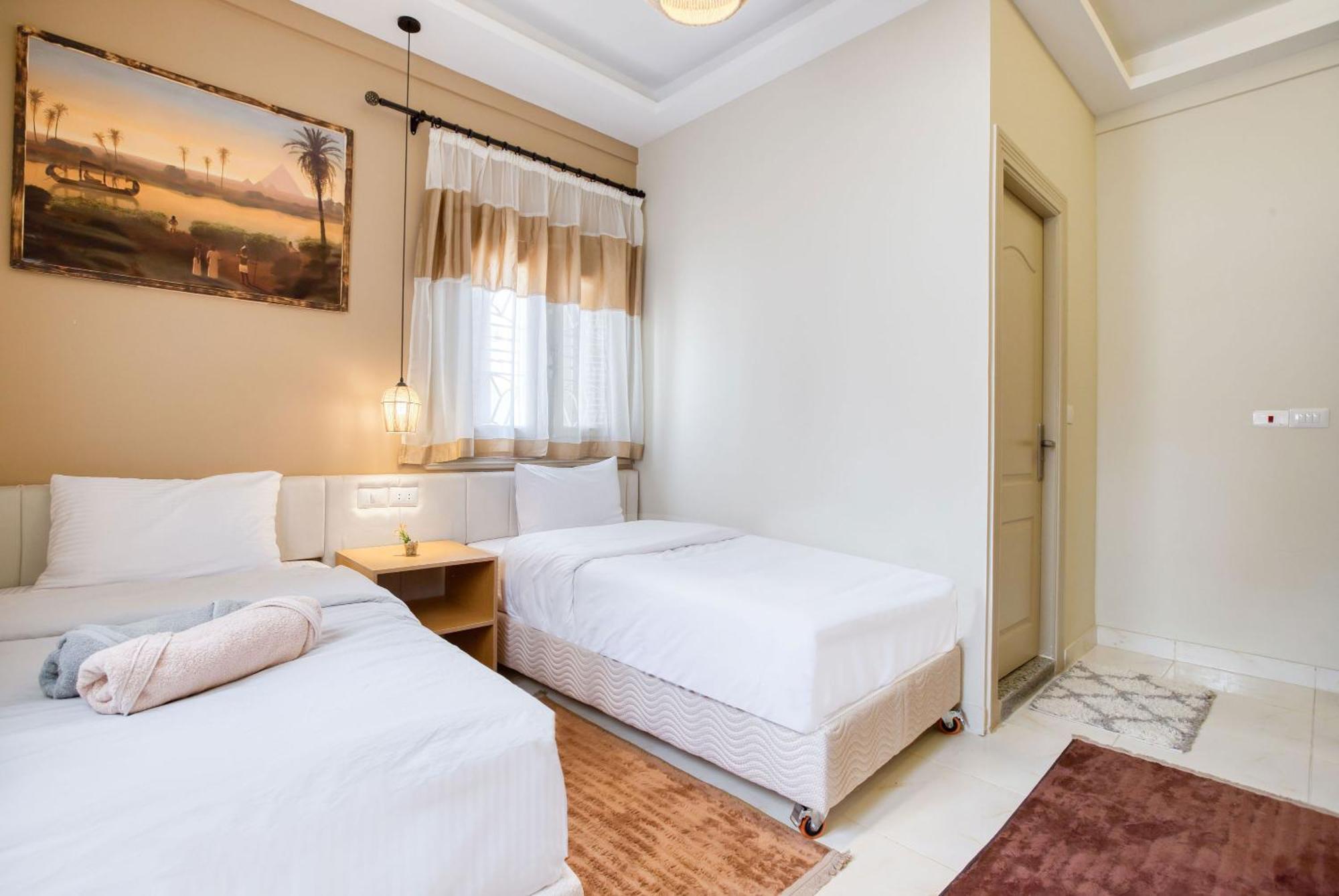 The Grand Pyramids View Hotel Kafret el-Gabal Quarto foto